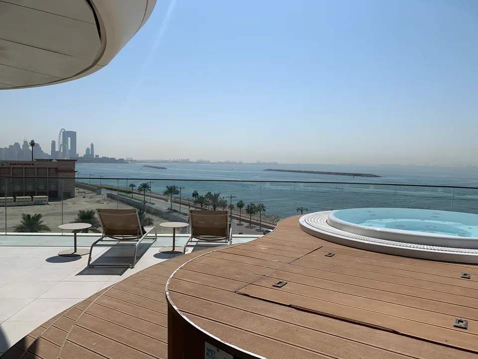 Waterfront terrace view at W Dubai – The Palm, photographed in May 2022